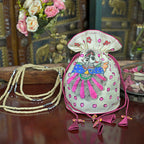 Hand-Painted Silk Potli Bag with Piping Accents