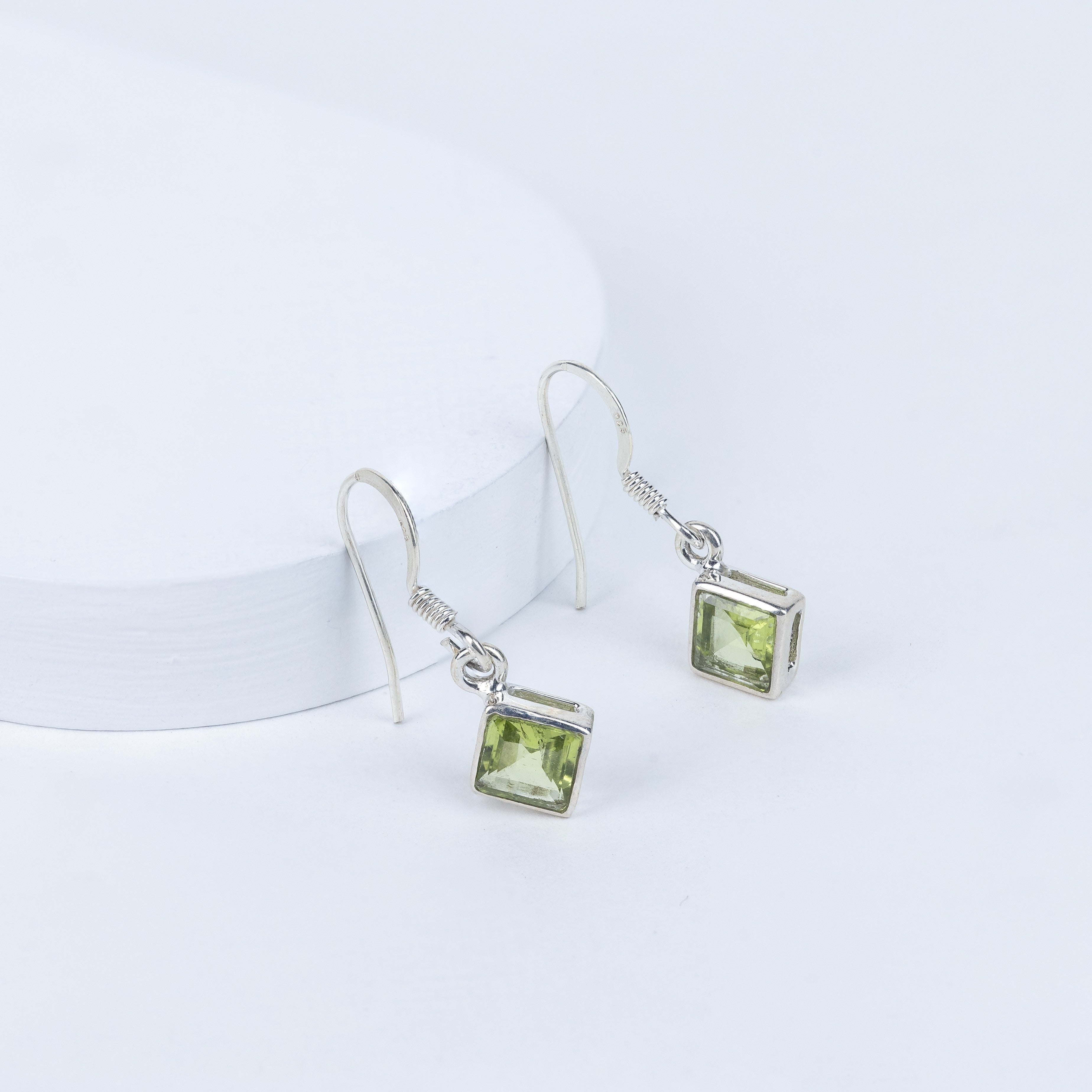 Perivolve Earrings in 92.5 Sterling Silver [ Peridot oval]