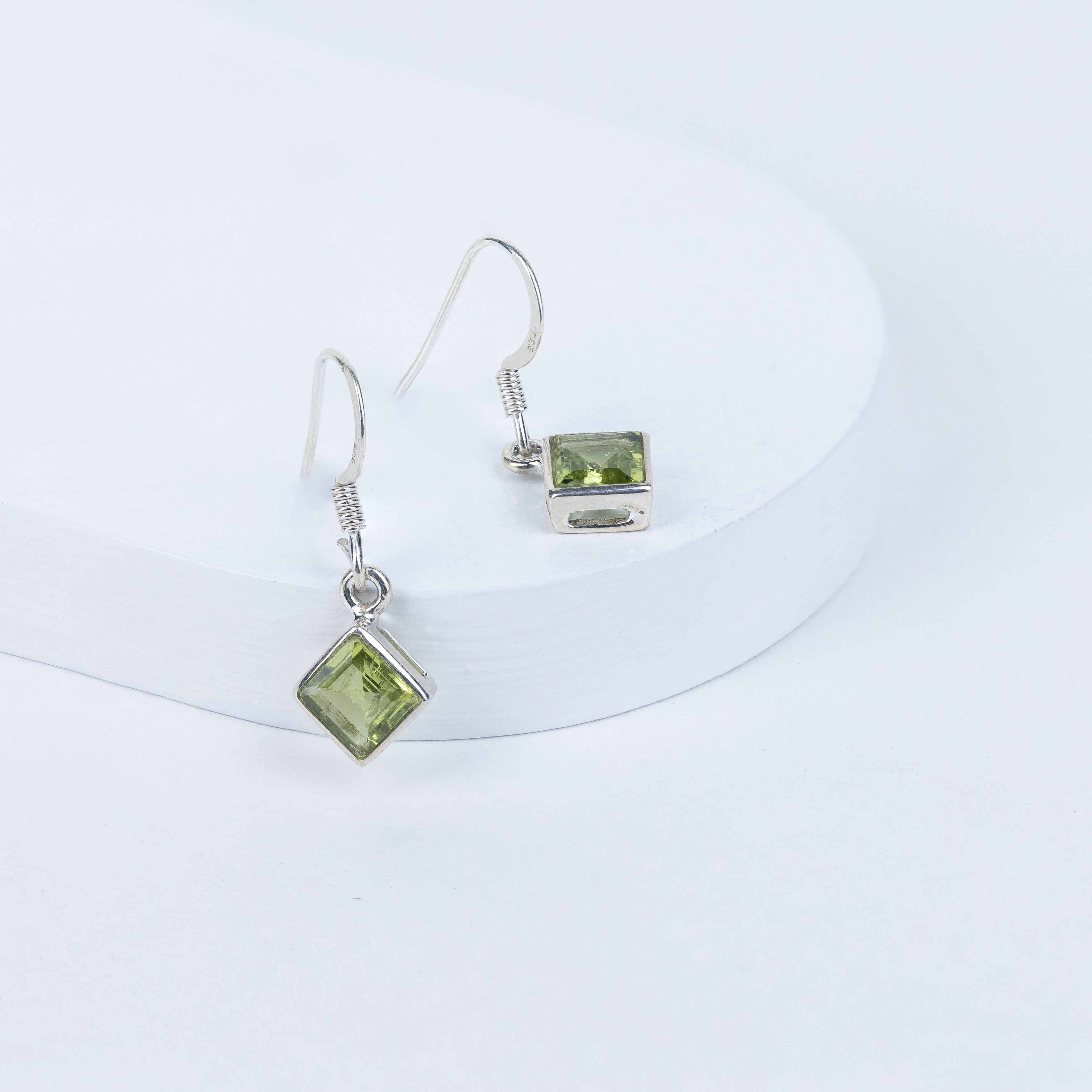 Perivolve Earrings in 92.5 Sterling Silver [ Peridot oval]