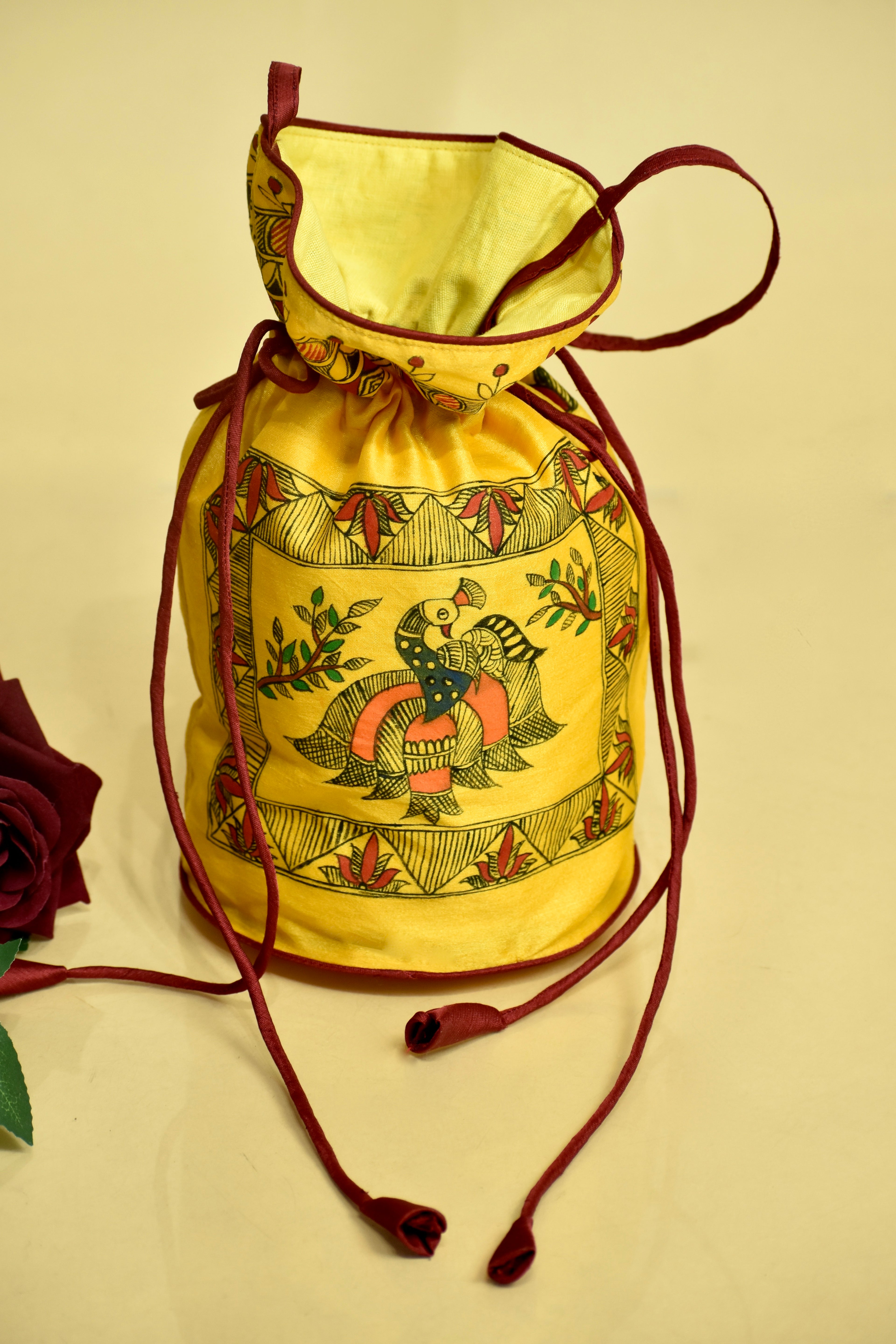 Symphony of Grace Silk Handpainted Madhubani Potli