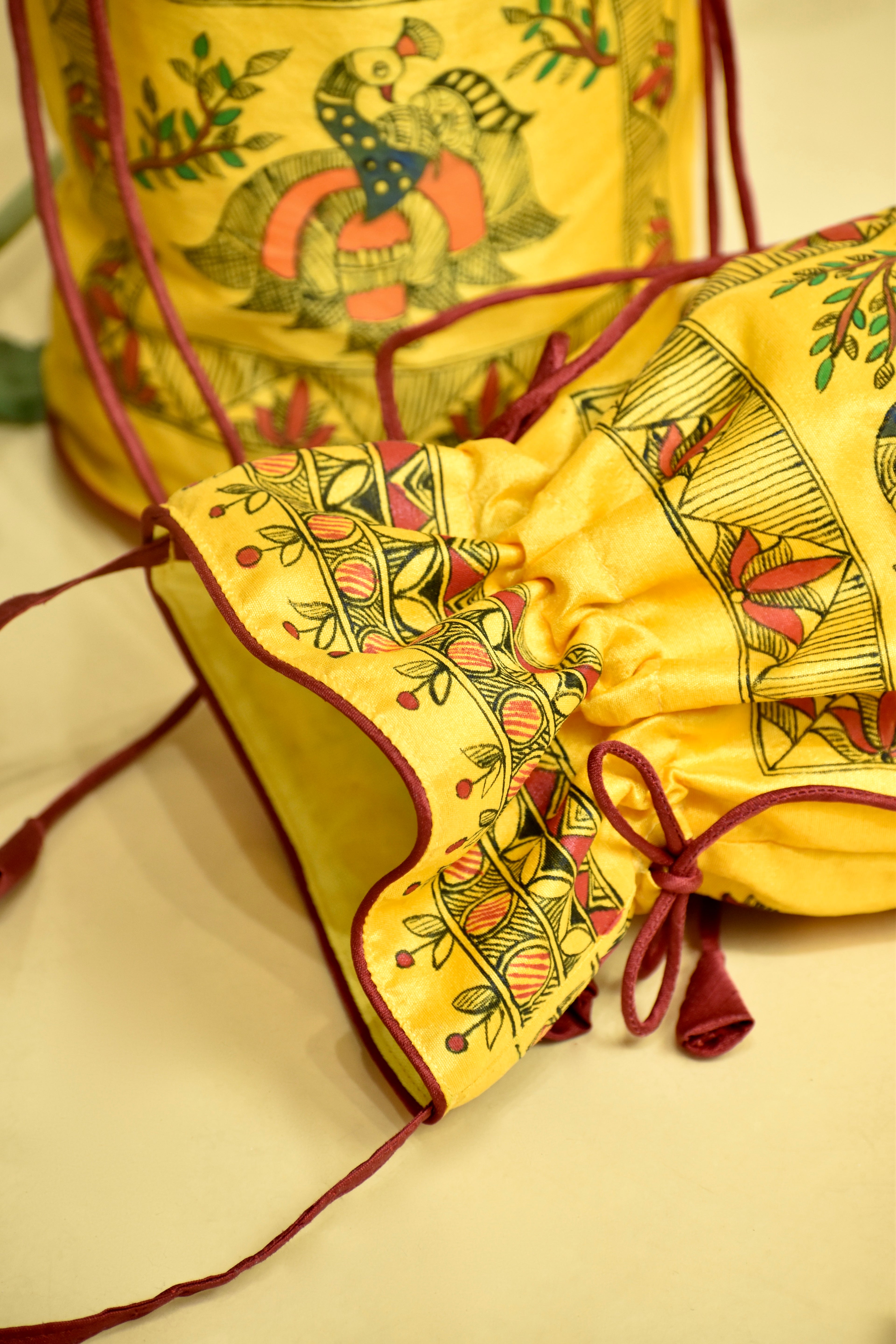 Symphony of Grace Silk Handpainted Madhubani Potli