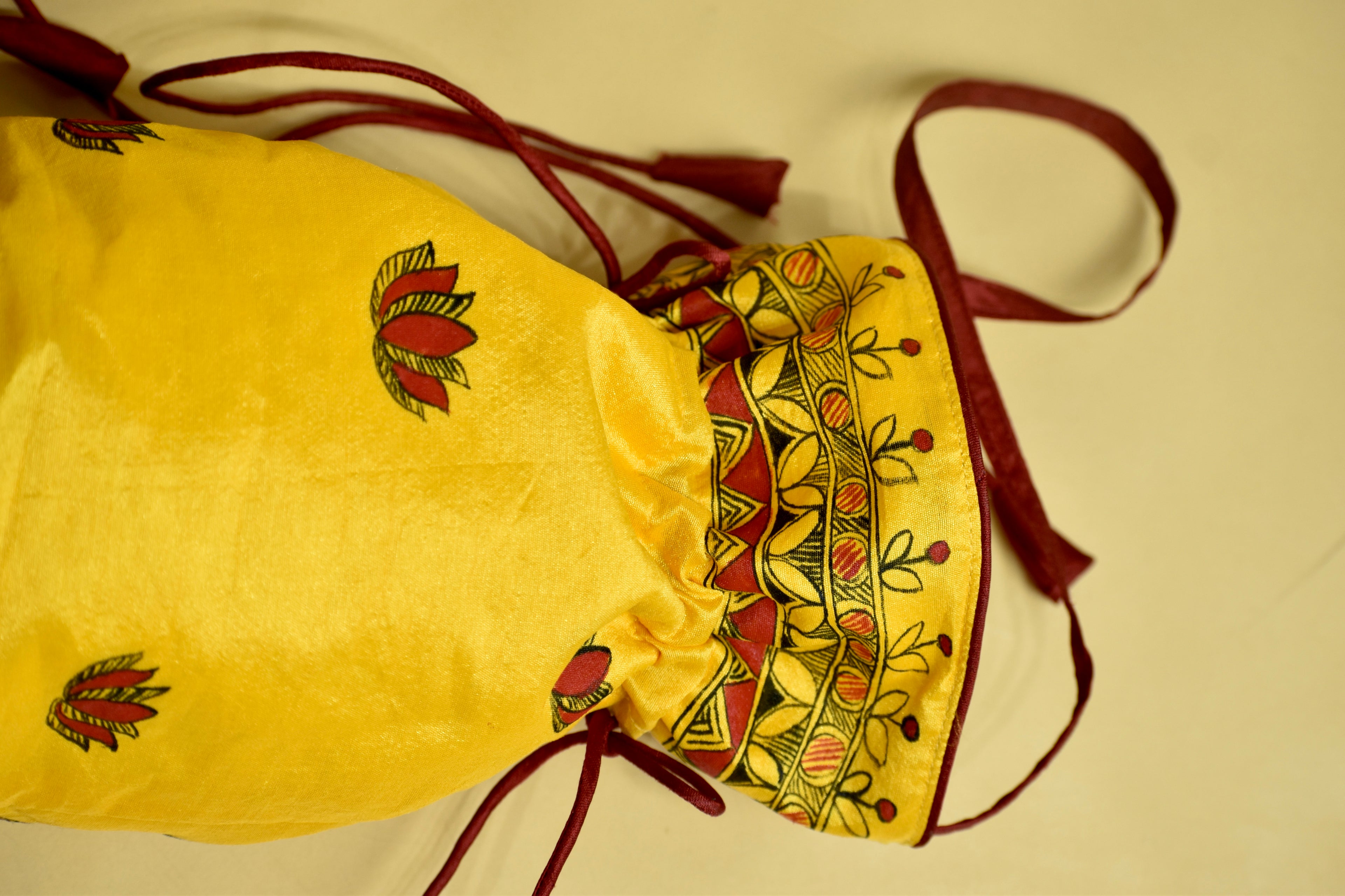 Symphony of Grace Silk Handpainted Madhubani Potli