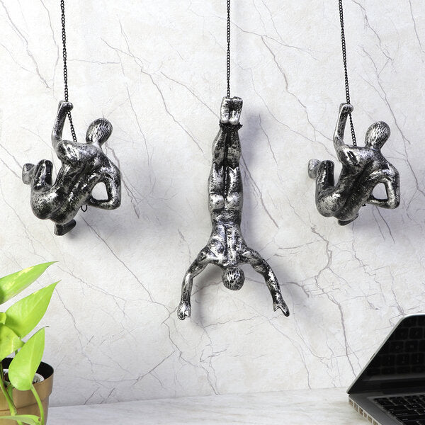 Amaya Decors Hanging Men with Chain Wall Art